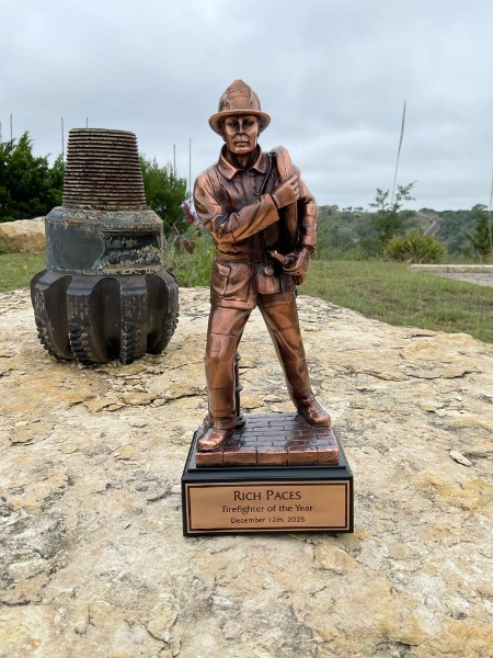 Rich Paces Firefighter of the Year statue, December 12, 2025