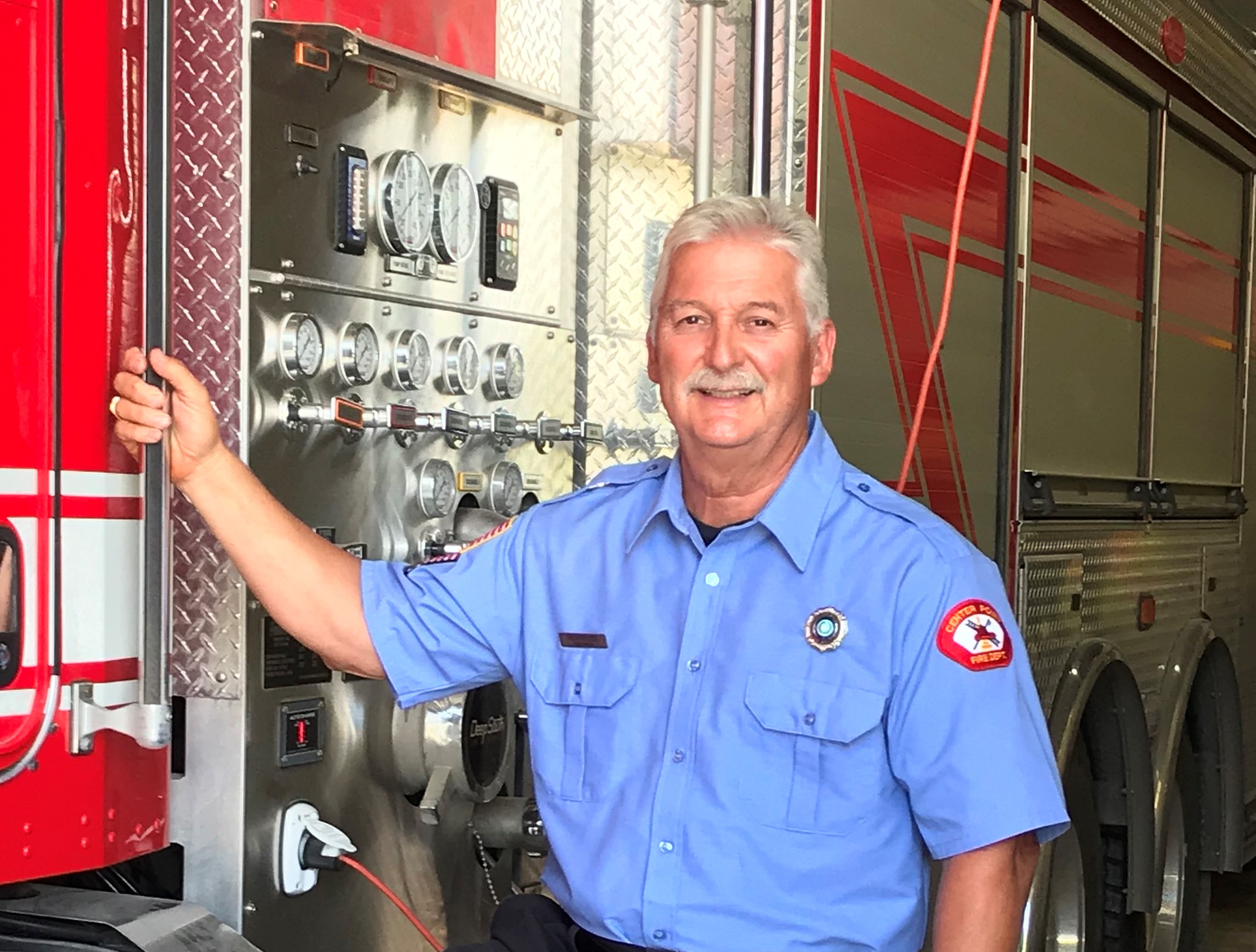 Rich Paces in firefighter turnout gear with Center Point VFD